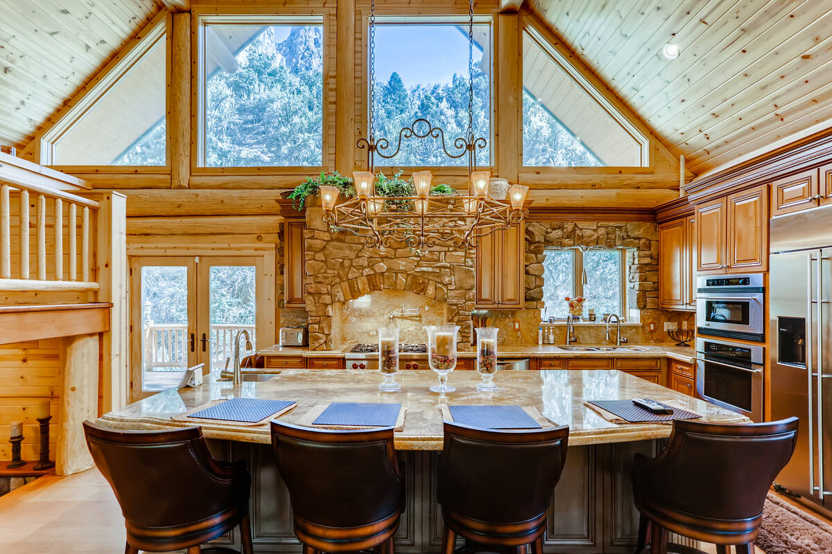 The kitchen has an extra-large island with seating. (Mt. Charleston Realty)