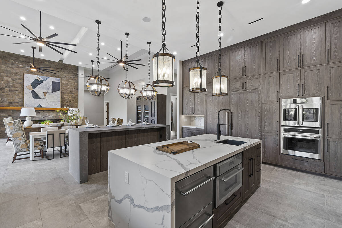 The kitchen has twin islands. (Darin Marques Group)