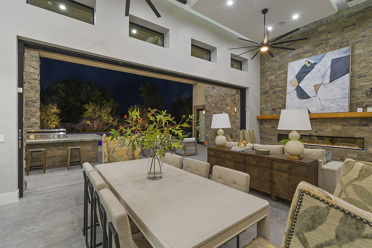 The dining room leads to the outdoor kitchen. (Darin Marques Group)