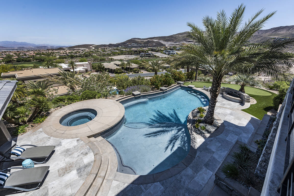 The yard has a resort-style pool and spa. (Rob Jensen Co.)