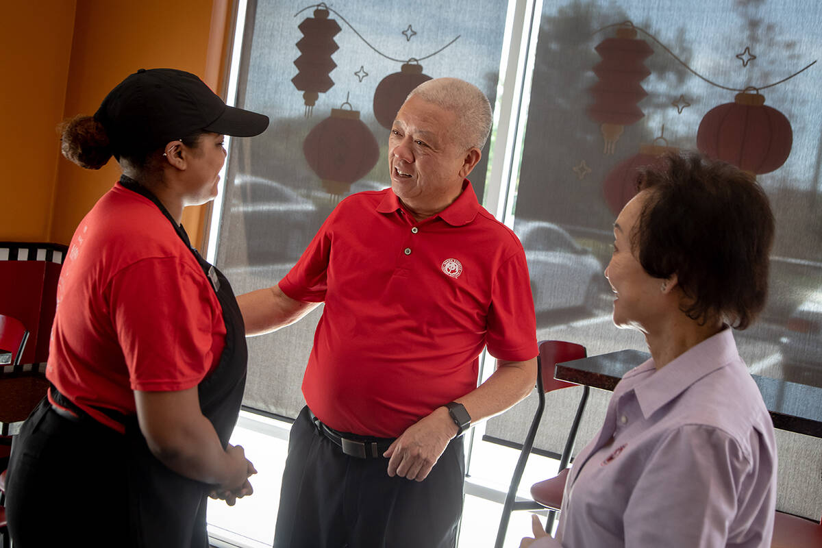 Staff meets with Panda Restaurant Group executives. The company offers a benefits package that ...