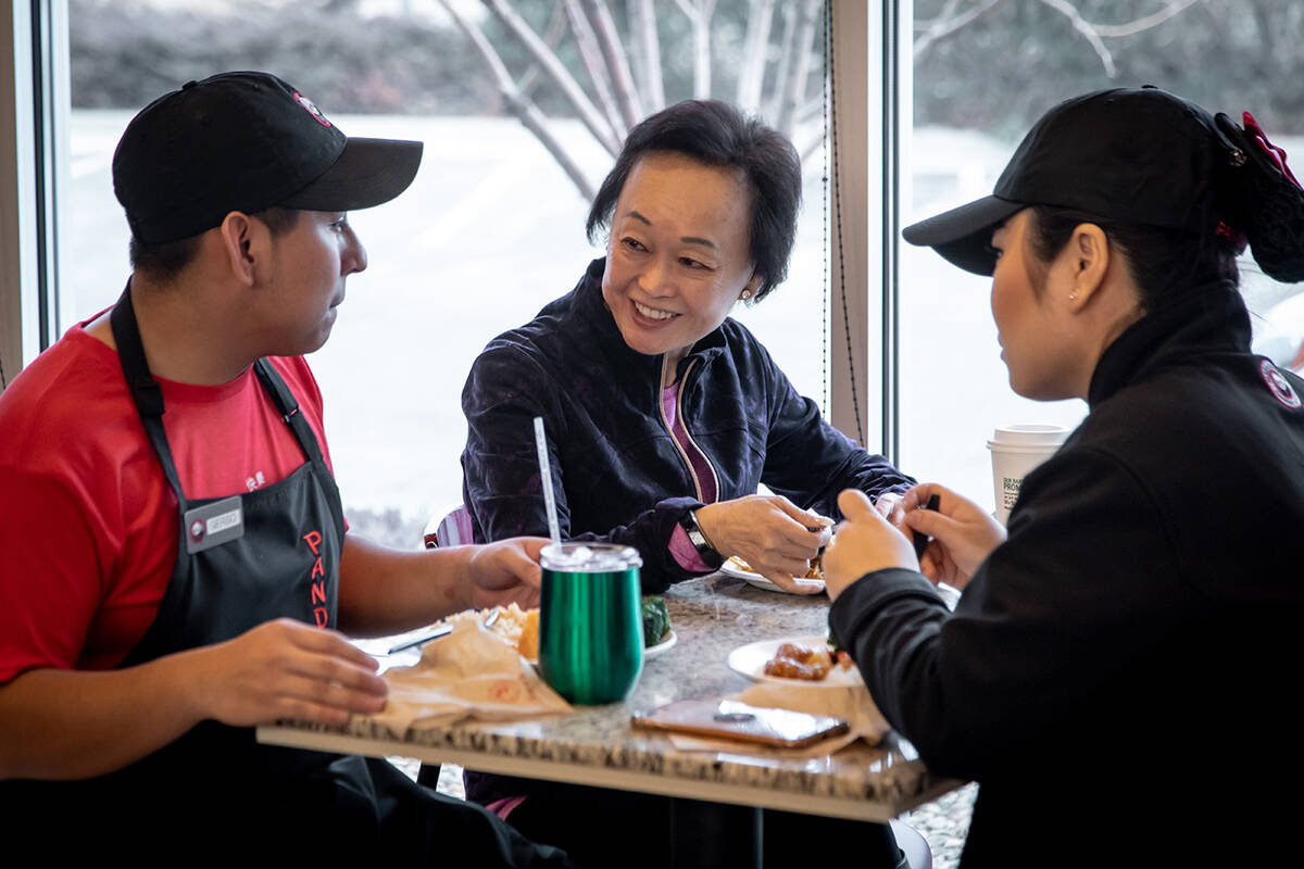Panda Restaurant Group staffers have lunch with co-founder Peggy Cherng. The company placed fir ...