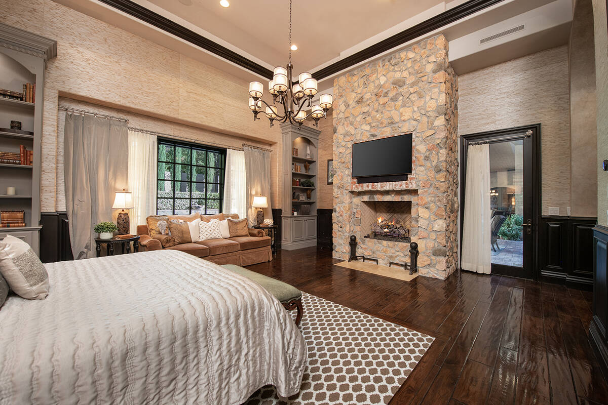 The master bedroom has a traditional fireplace. (Simply Vegas)