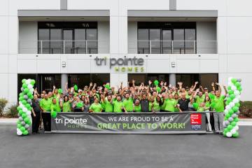 Klif Andrews, wearing the black shirt on the far right, division president, Tri Pointe Homes, i ...