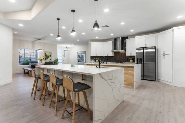 The kitchen's second island has seating. (Sotheby’s International Realty)