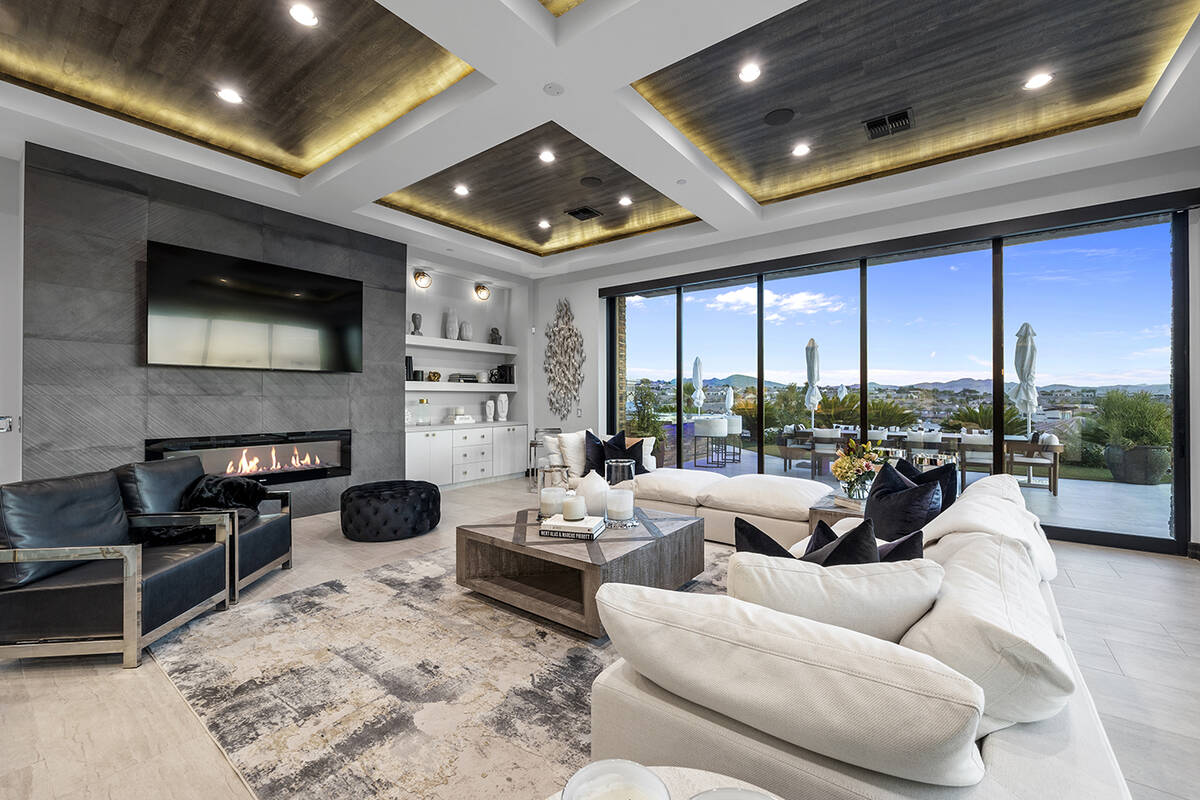 The living room opens to the pool area. (Douglas Elliman, Nevada)