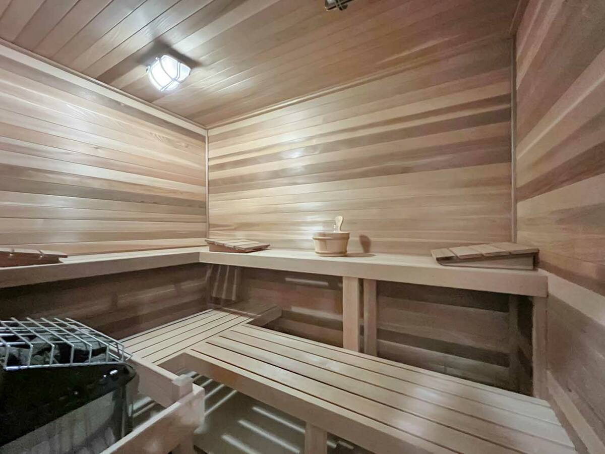 The home features an array of amenities, including a steam room and sauna. (1st Class Real Esta ...