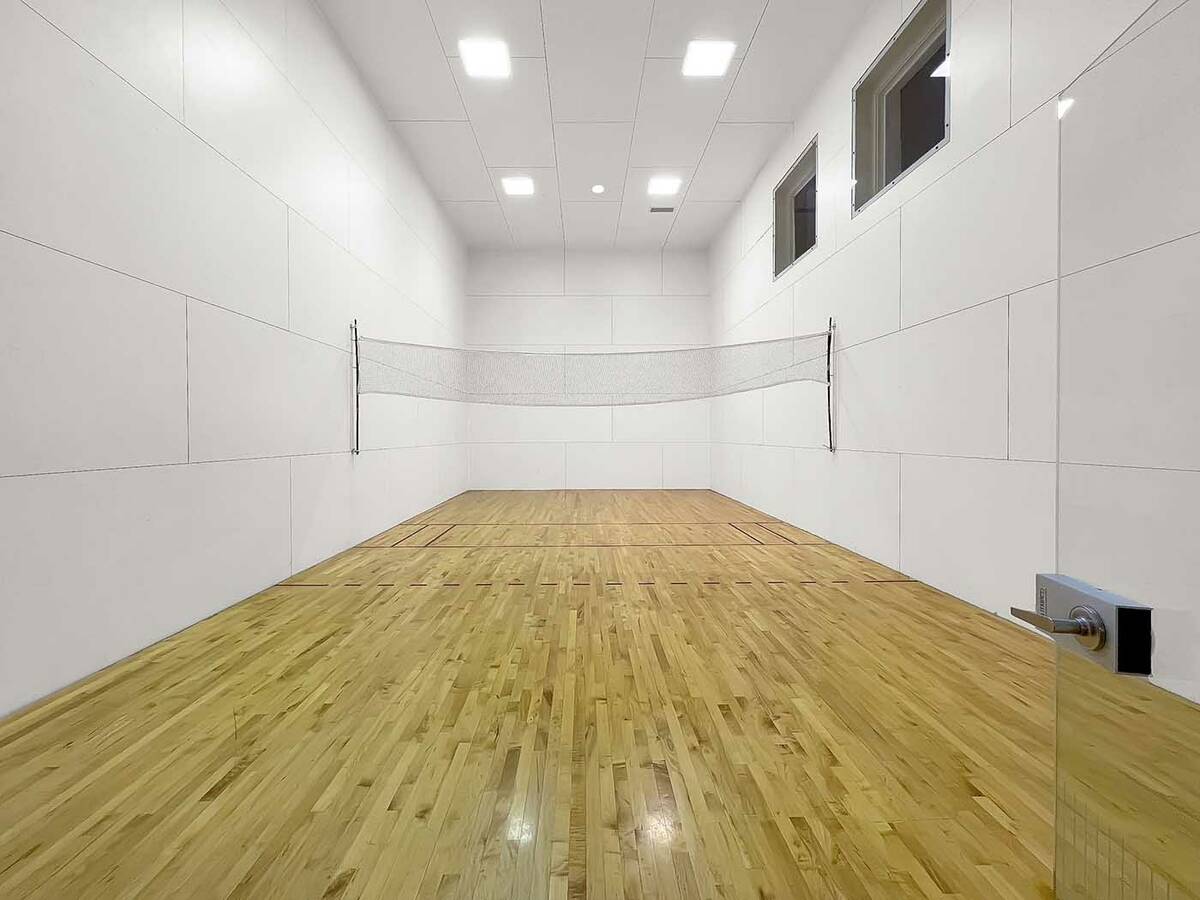 The 9,954-square-foot home features an underground racquetball court. (1st Class Real Estate Ve ...