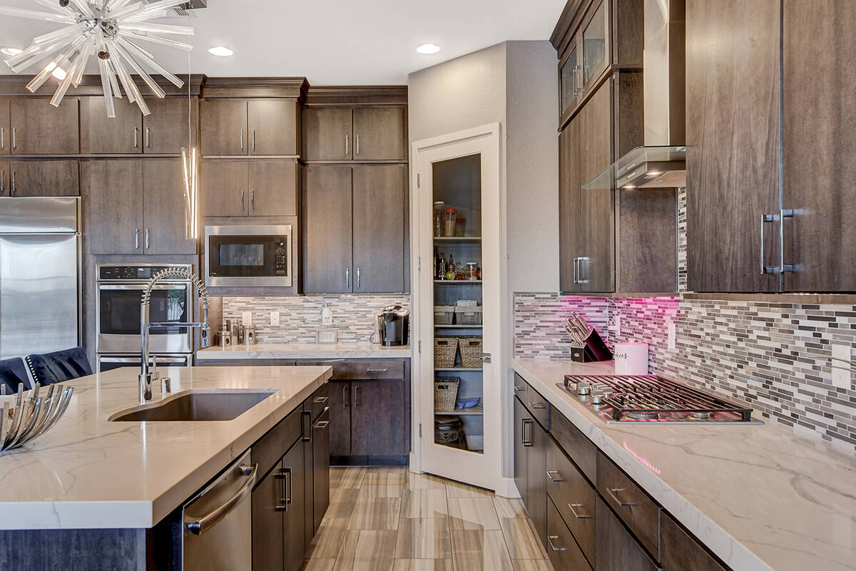 The kitchen features upgraded appliances. (Realty ONE Group)