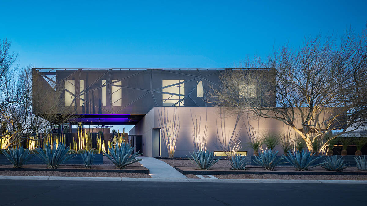 This home at 20 Soaring Bird in The Ridges in Summerlin was designed by assemblageSTUDIO. It wi ...