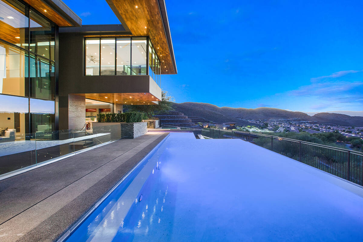 The home built in 2016 was made for entertainment with an infinity-edge pool and lower-level en ...