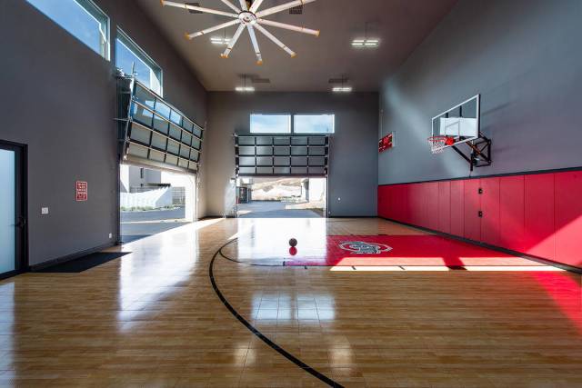 This Blue Heron home in MacDonald Highlands doubles as a basketball court. (Blue Heron)