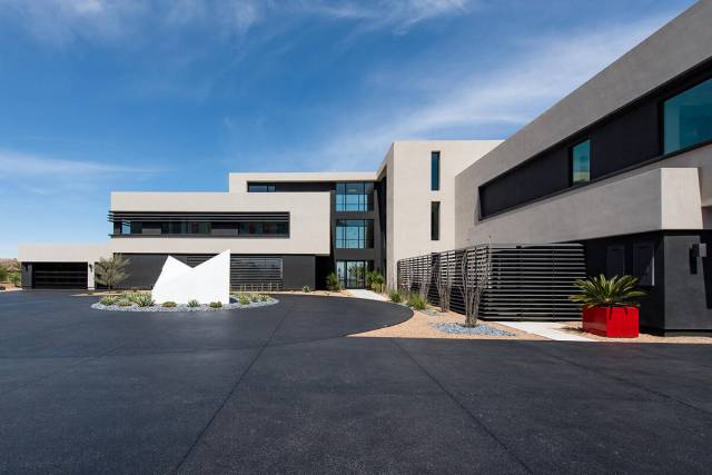 Blue Heron is building garages in The Summit Club and MacDonald Highlands that can fit 16 to 18 ...
