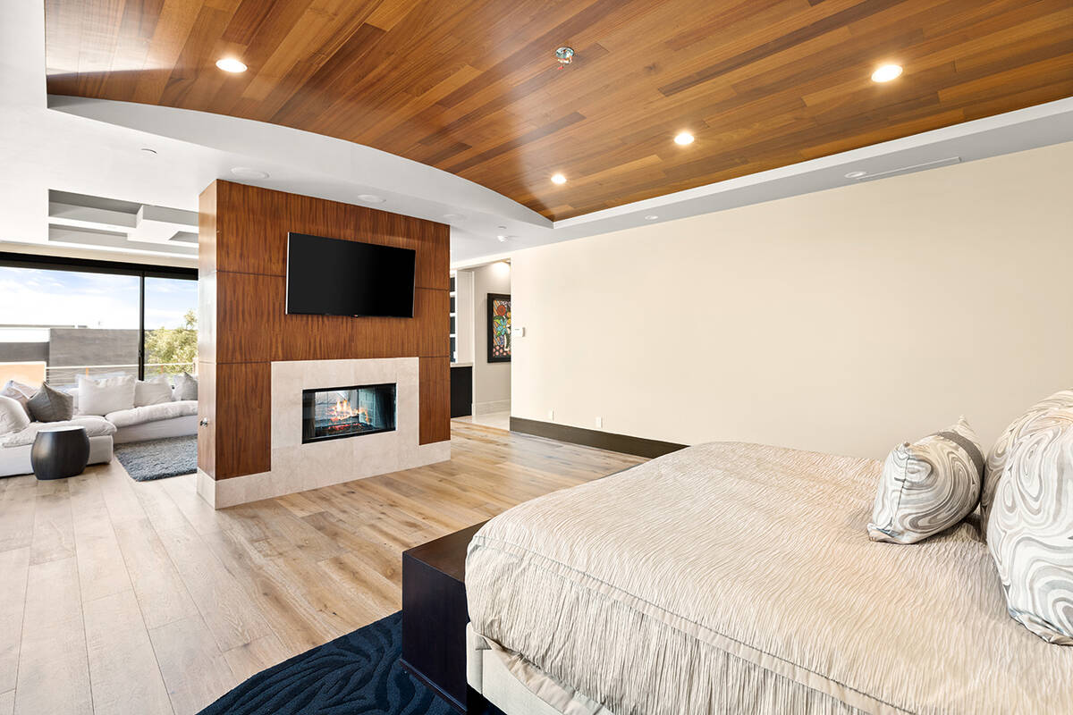 The master suite has a fireplace. (BHHS)