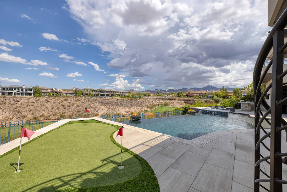 The pool and putting green. (Douglas Elliman of Nevada)