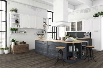 Luxury vinyl flooring captures the feel of wood with durability and low maintenance. (Coverings ...