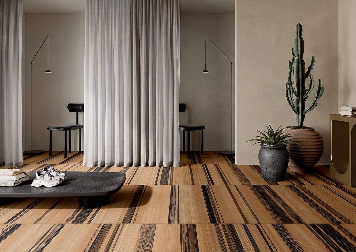Flooring tiles can be designed with the feel of wood. (Coverings/Tele di Marmo Precious line)