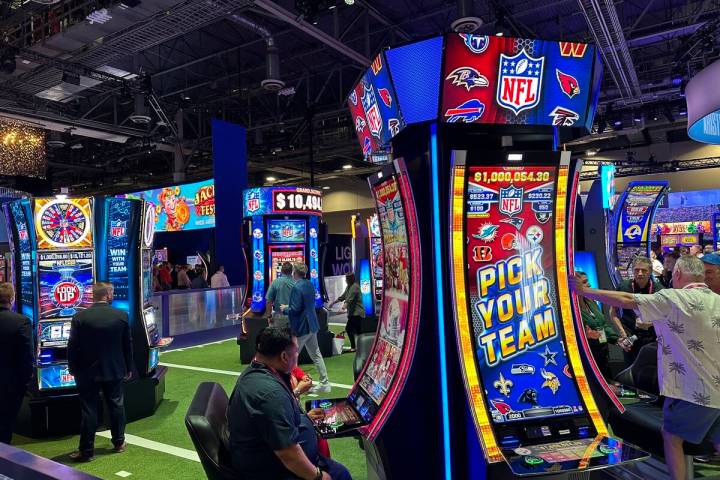 The 2023 Global Gaming Expo featured NFL-themed slot machines at Aristocrat Gaming's booth. (Mi ...