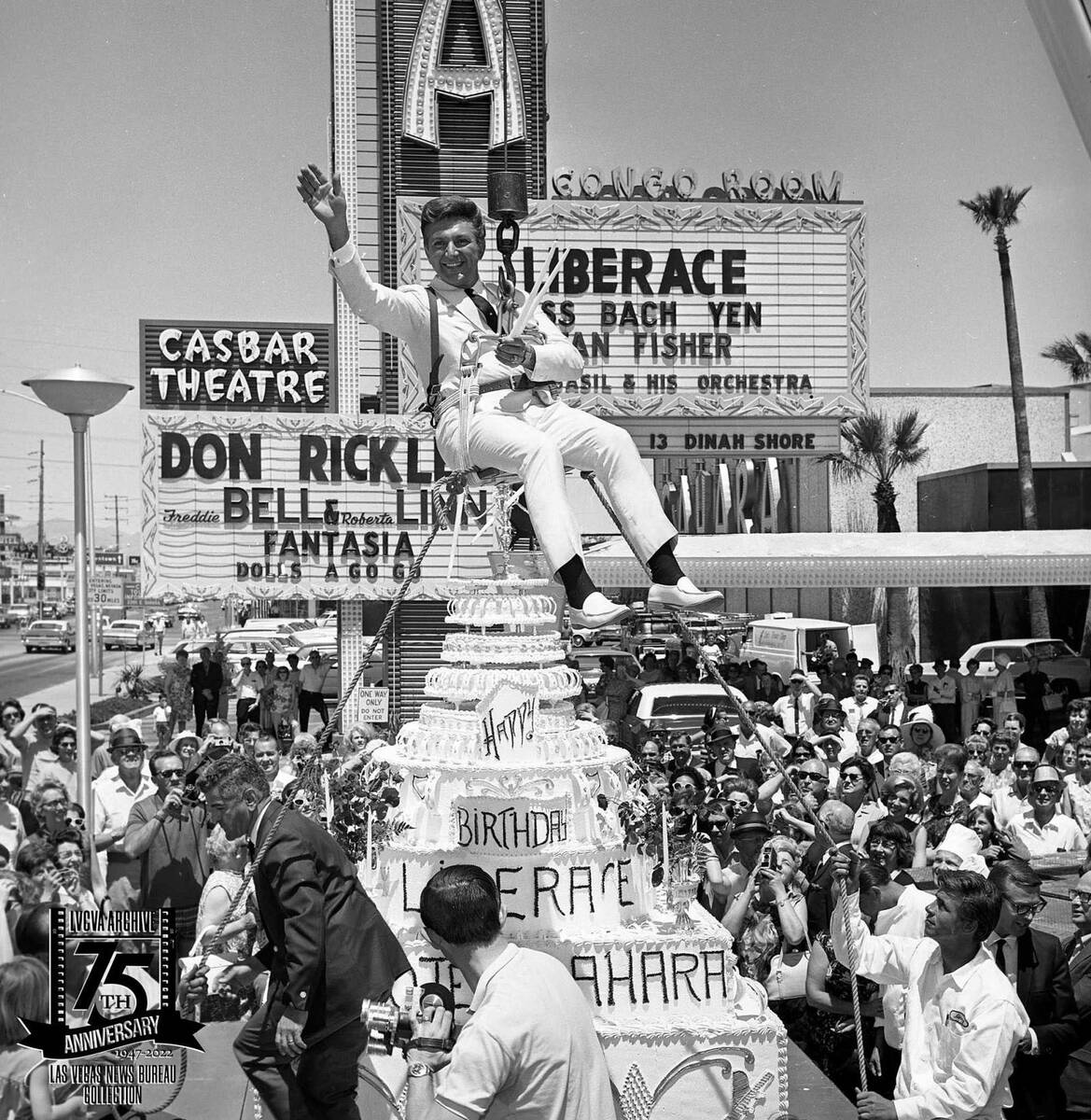 Liberace hanging above his birthday cake in front of the Sahara on May 16, 1967. (Las Vegas New ...