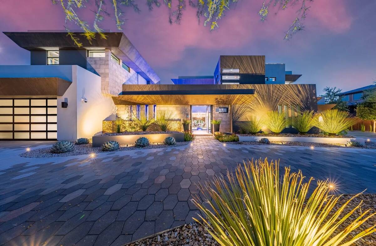 The 9,049-square-foot Summerlin home in the Ridges has listed for $15 million. It has two garag ...