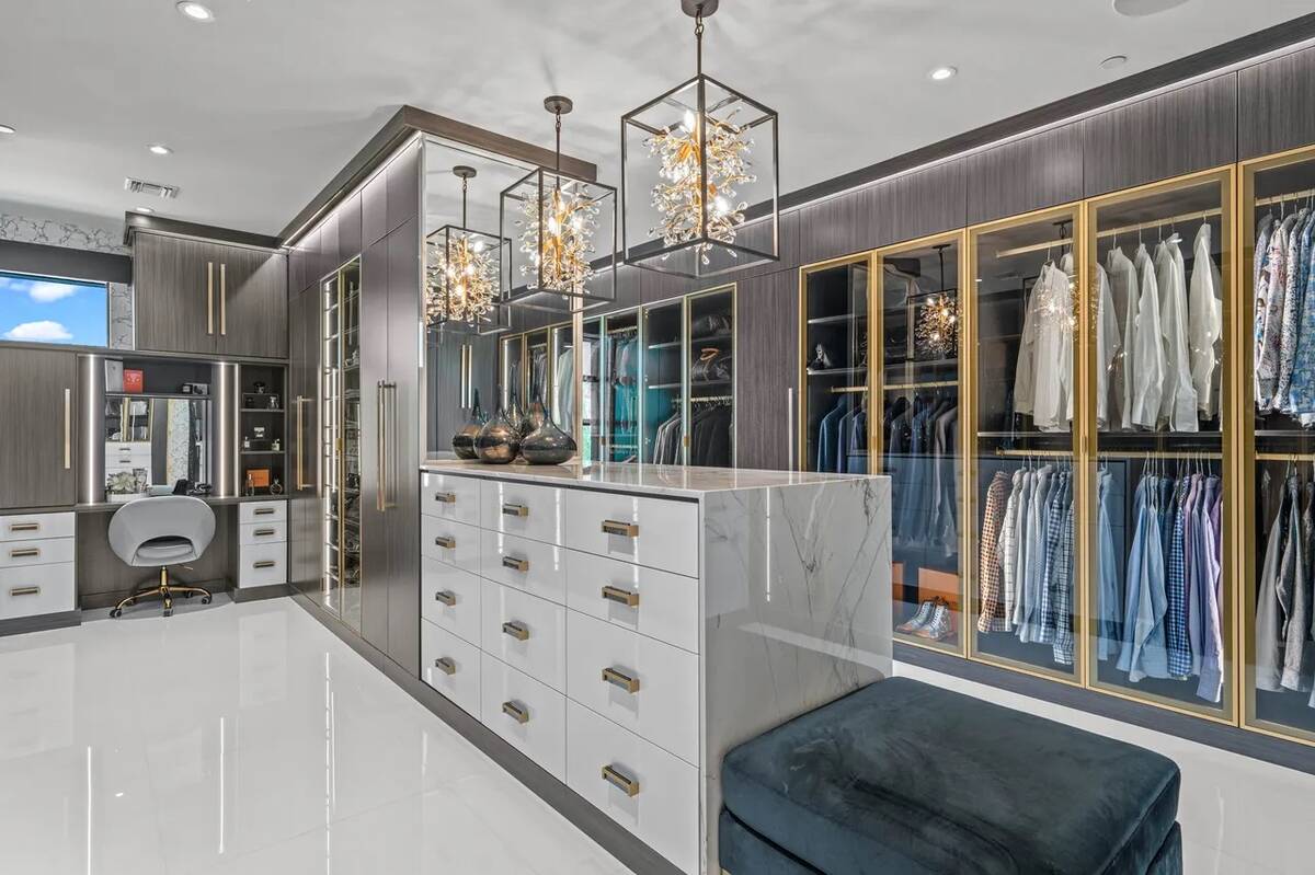 The walk-in closet in the primary suite was upgraded in the remodel with extra square footage a ...