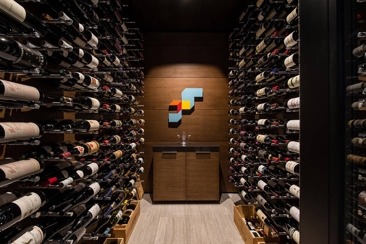Contemporary designs can adapt to any space, from an oversized glass-encased wine room displaye ...
