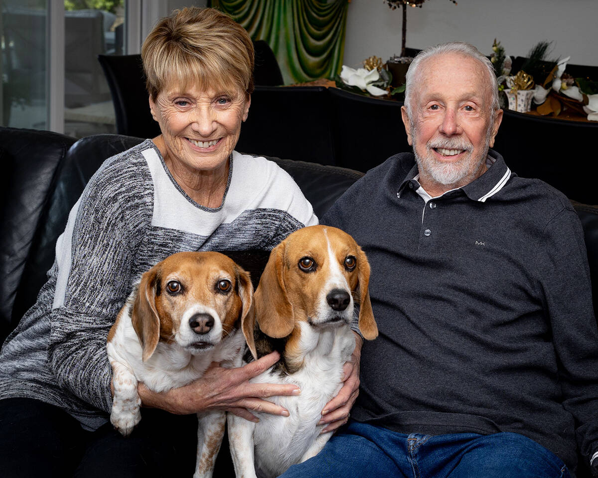 Kathi and Mickey Sarkin with their two beagles, Sadie and Cash. (Tonya Harvey/Real Estate Millions)