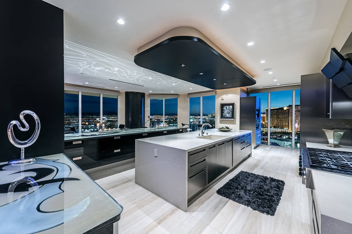 The two-story $8 million Turnberry Place penthouse has two kitchens and multiple entertaining a ...
