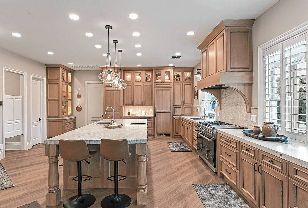 The Hellmuth Borges Team The fully remodeled kitchen showcases custom quarter-sawn oak cabinet ...