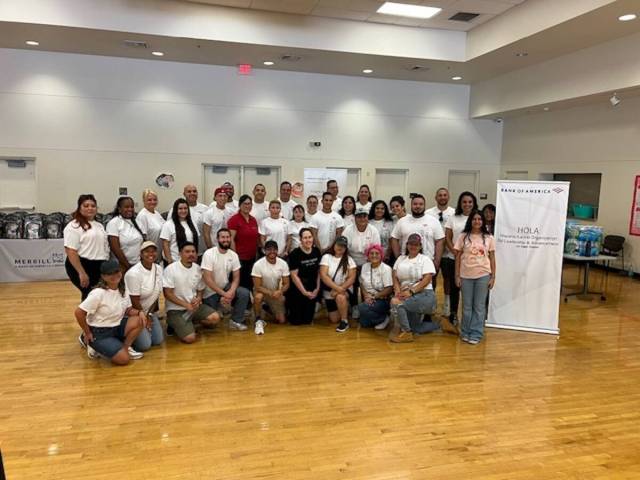 Volunteers from Bank of America distributed 2,000 backpacks to Southern Nevada students to help ...