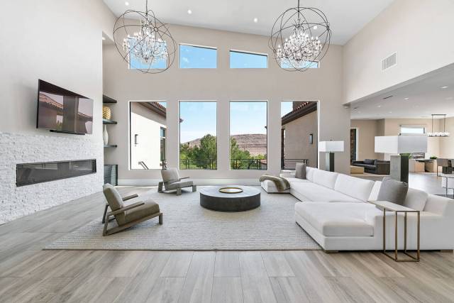 The estate on Olympia Canyon Way was designed by Vida Design Studios and built by TransCon Paci ...