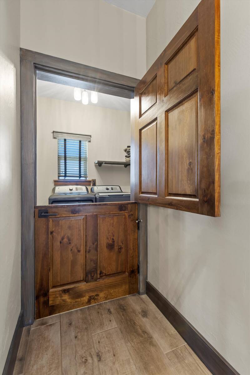 Saloon-style doors guard the water closet. (Mt. Charleston Realty Inc.)