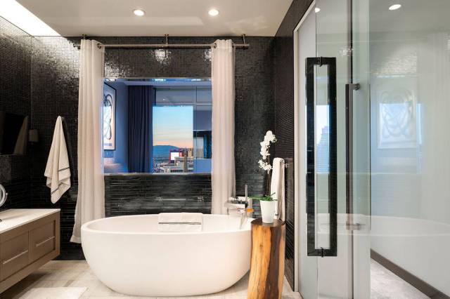 The master bath has a modern design. (Berkshire Hathaway Home Services)