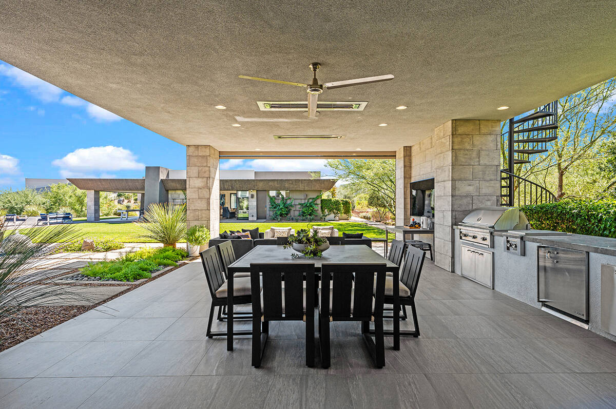 The outdoor kitchen is part of the resort-style backyard. (Real Broker LLC)