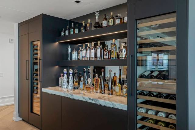 The bar has wine storage on both sides. (Lusso)