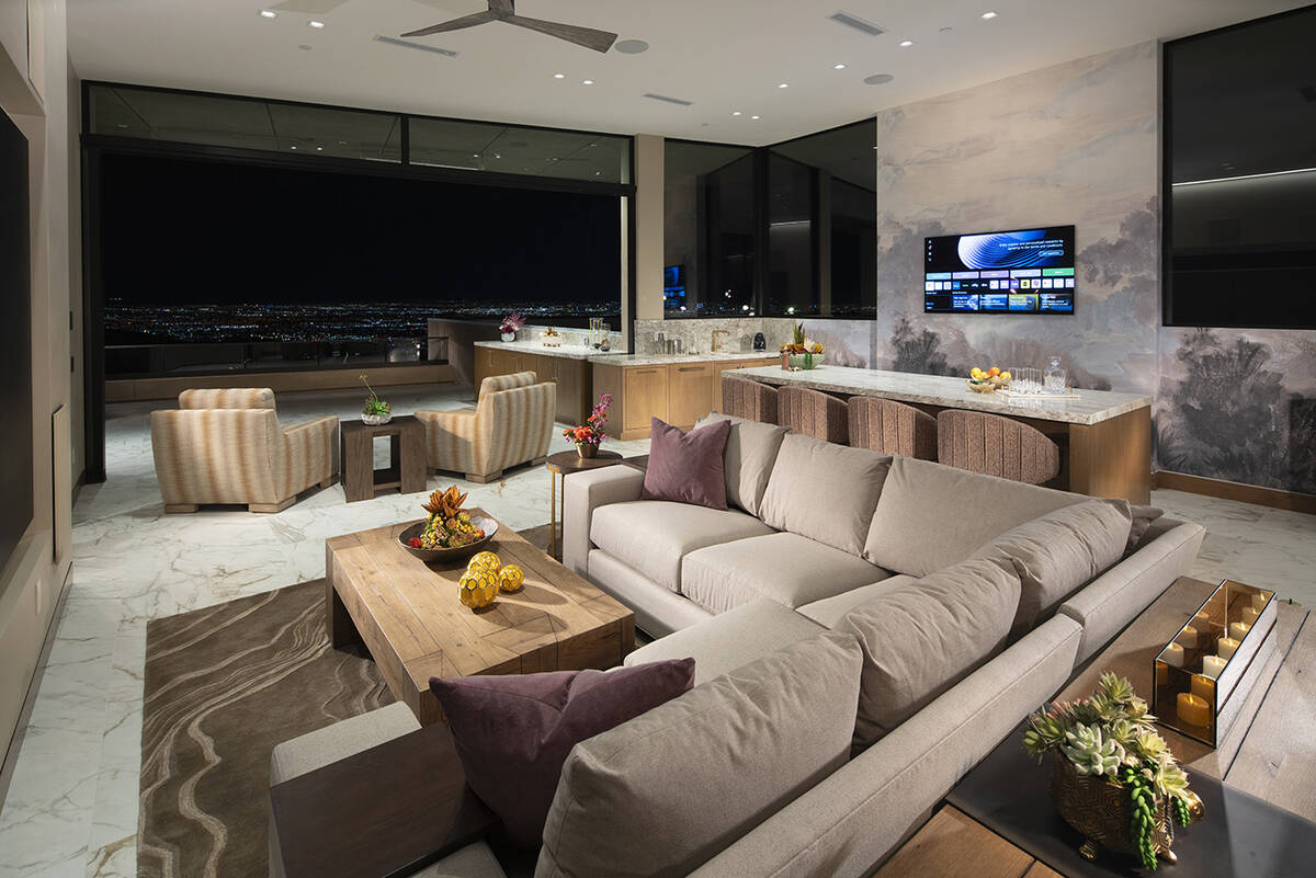 The living area opens to the resort-style backyard. (©2025 501 Studios, courtesy Pro Builder M ...