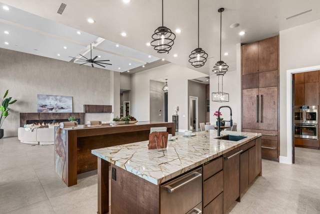 The kitchen has a large prep island. (Stetson Ybarra/Rooted Elements)