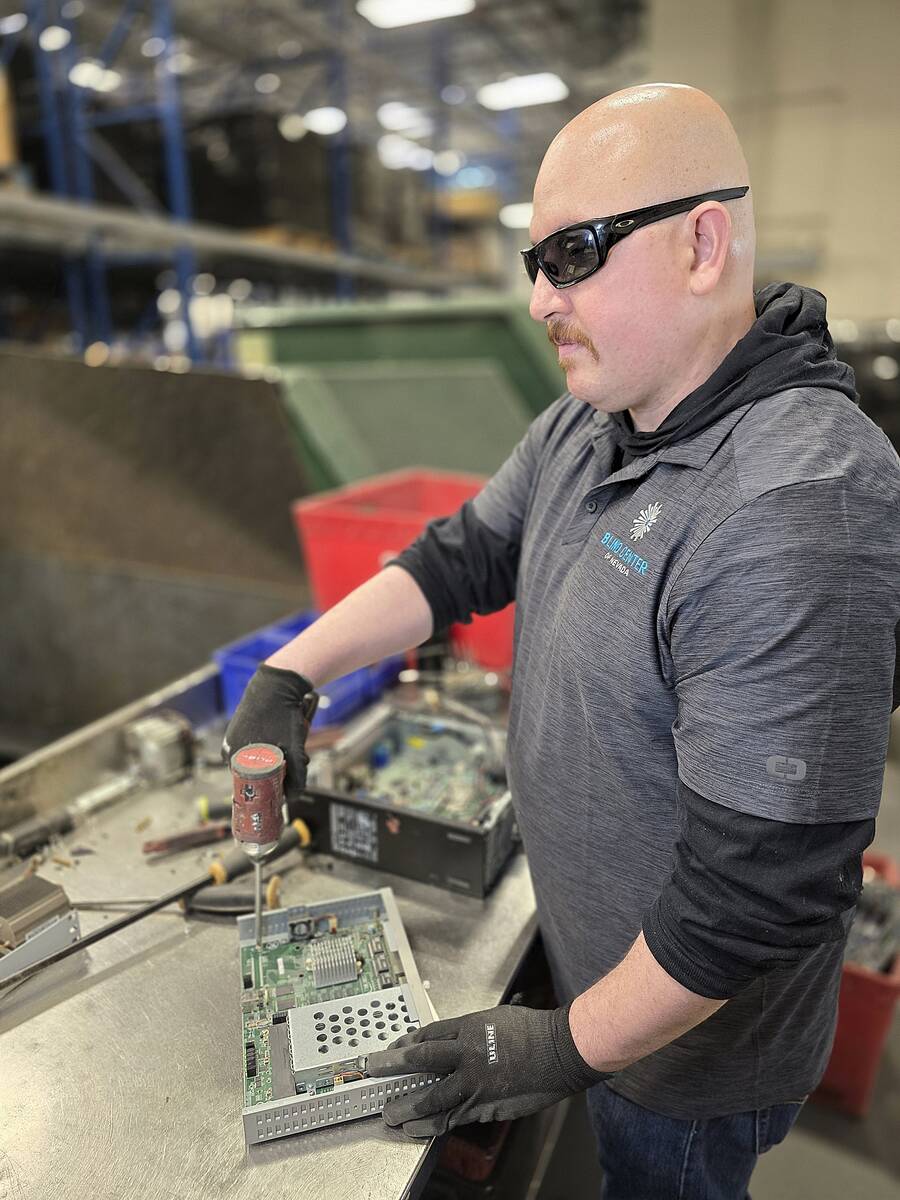Marco Martinez works in The Blind Center of Nevada’s Electronic Recycling and Refurbishing Op ...