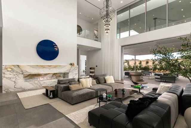 The home is equipped with home automation, elevator and private gated driveway. (Courtesy of IS ...