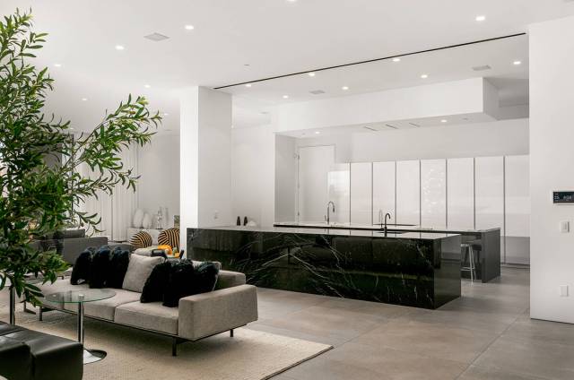 The chef’s kitchen has top-of-the-line appliances and two 15-foot natural stone islands. (Cou ...