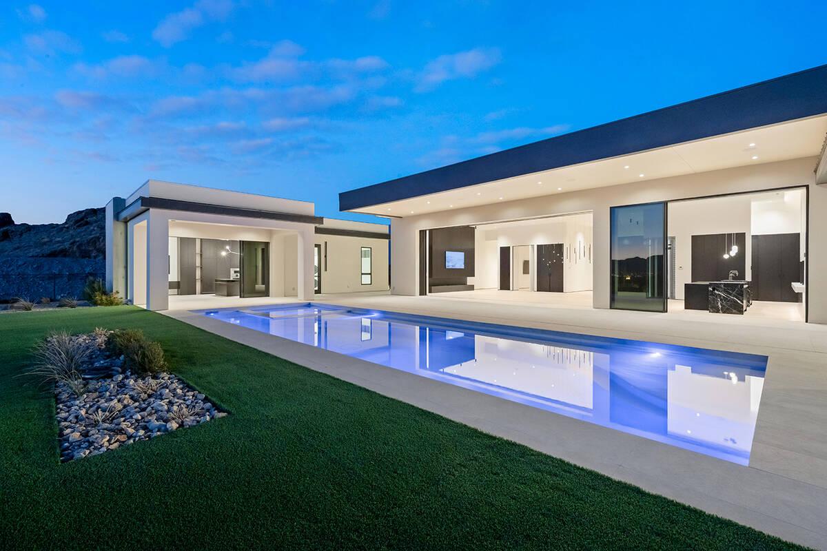 The MacDonald Highlands home sits on 0.6 acres and has a swimming pool. (IS Luxury)