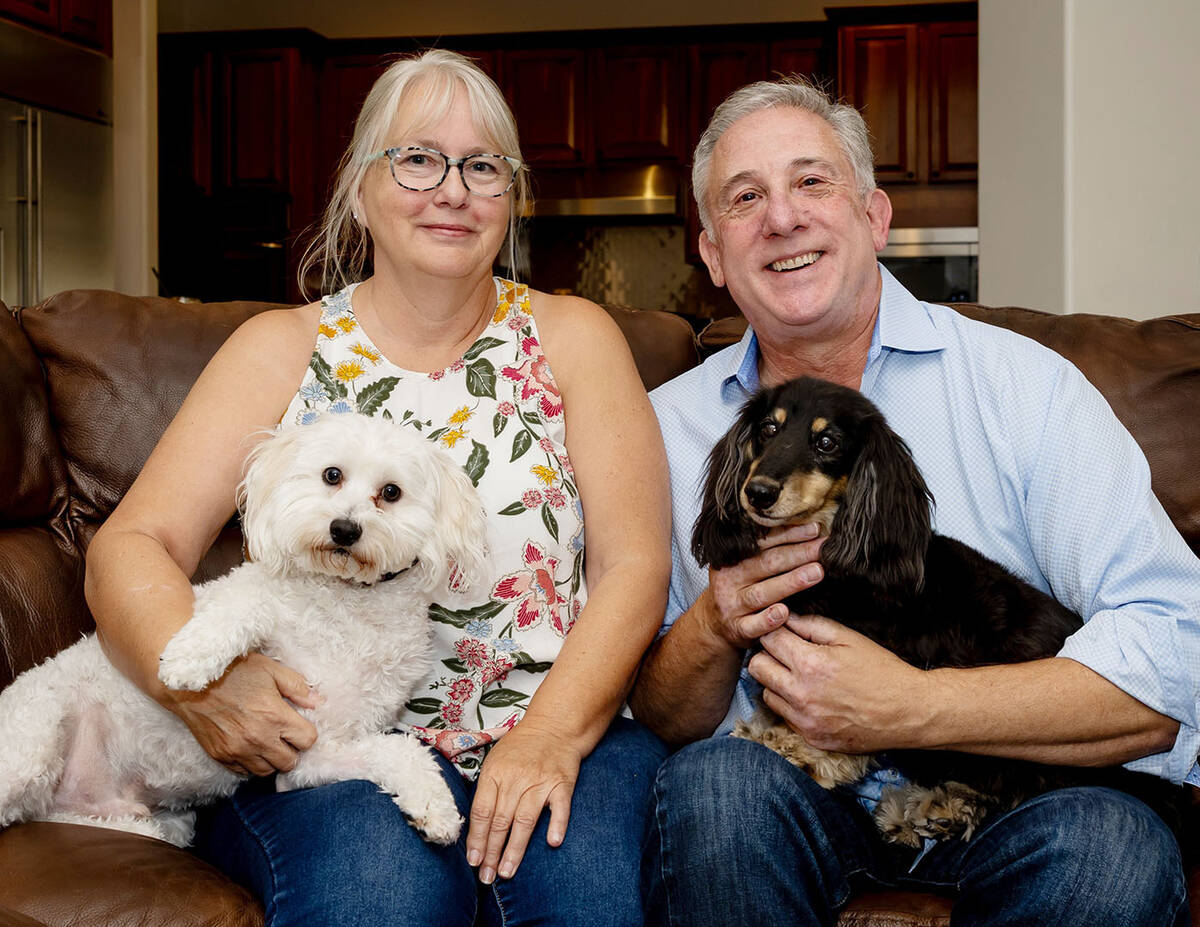 Valerie and Tom Wucherer with their dogs in their Summerlin home. (Tonya Harvey/Real Estate Mil ...