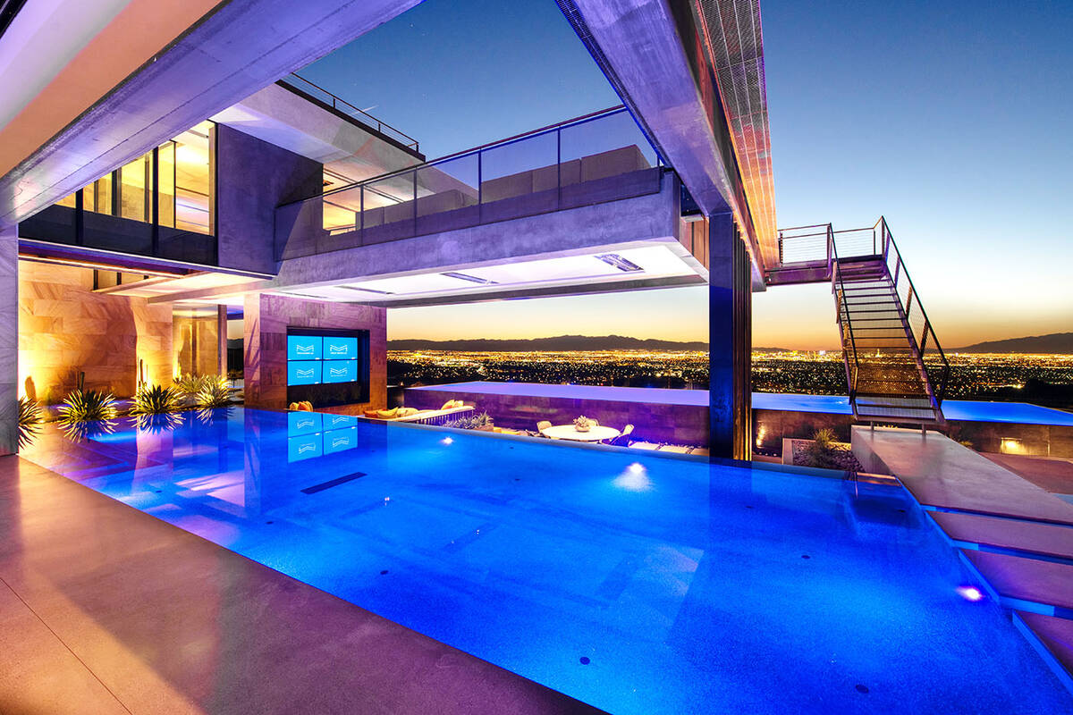 Built in 2020, the three-story Henderson home built by Blue Heron sits on 1.25 acres and measur ...