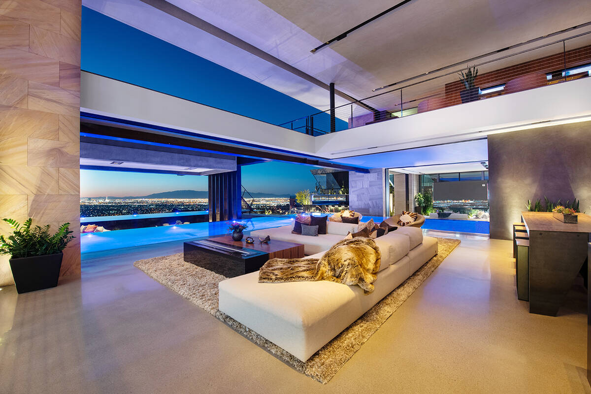 Every room in the MacDonald Highlands mansion showcases views of the Las Vegas Strip, mountains ...