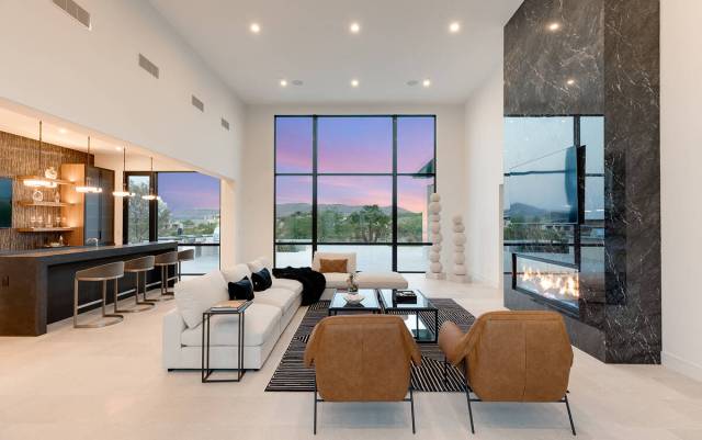 The mansion on Discovery Peak Court in The Summit luxury community measures 11,974 square feet ...
