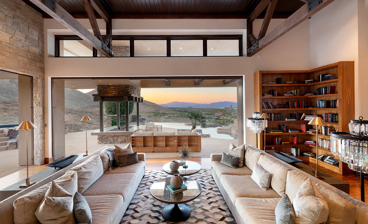 This Summerlin mansion measures 13,318 square feet and has five bedrooms, eight baths and six-c ...