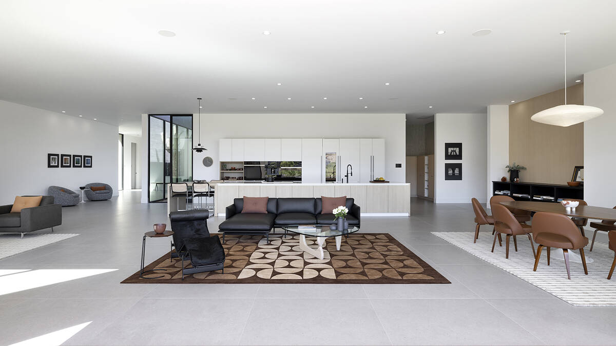 The home has soaring ceilings, floor-to-ceiling windows and automated pocket sliders for seamle ...