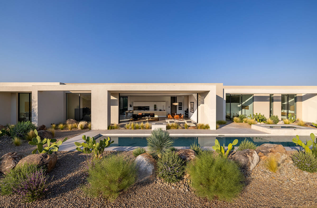 The one-story home of 7,669 square feet has five bedrooms, 5½ baths and a five-car garage. (IS ...