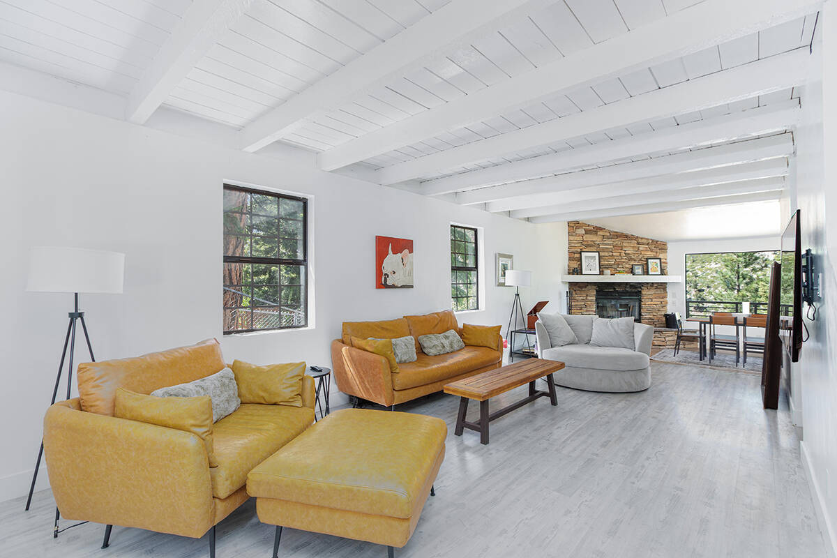 Spanning 2,931 square feet, the four-bedroom, three-bath home blends cozy alpine aesthetics wit ...