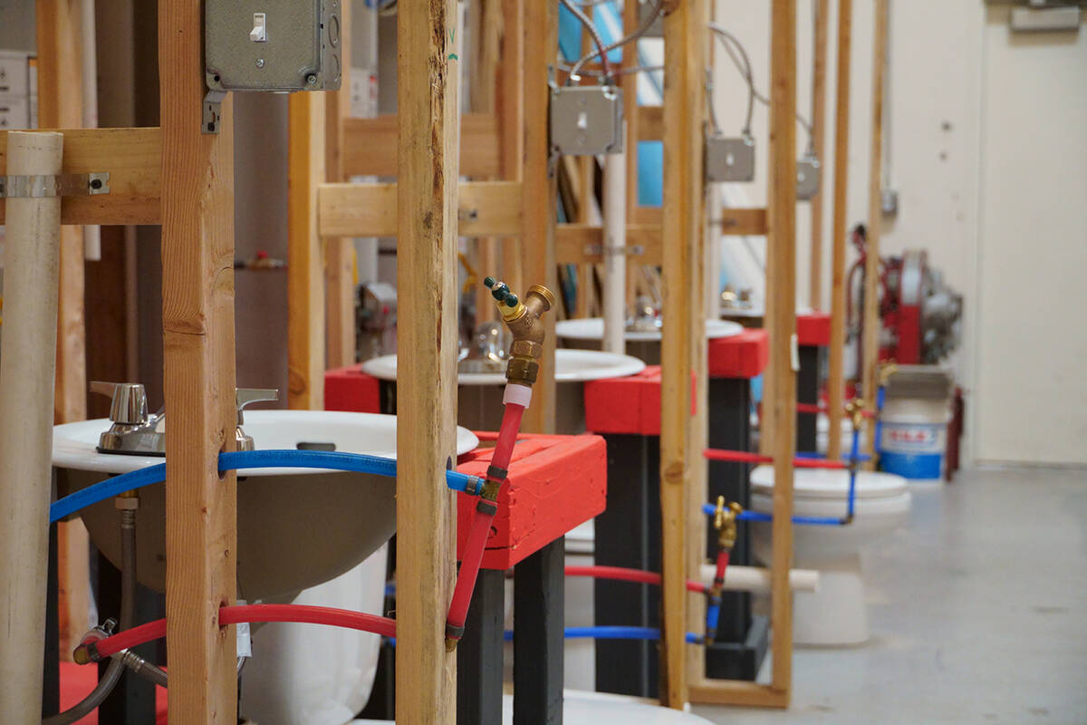 Students learn plumbing repair skills in this lab. (Photo courtesy of NTI Trade School)